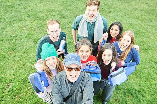 outdoors photoshoot with the recycled bags from the Berlaymonts banner for social media team